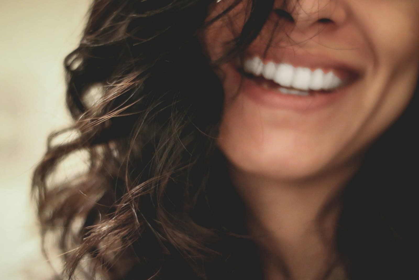 Close-up portrait of a smiling young woman